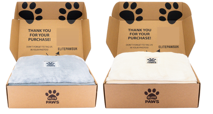 Two Elite Paws Luxury Dog Blankets in their cardboard packaging